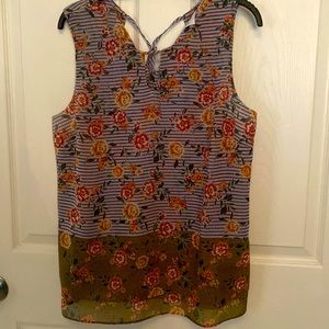 Cabi Penelope blouse in a beautiful bronze and green floral. Size M.